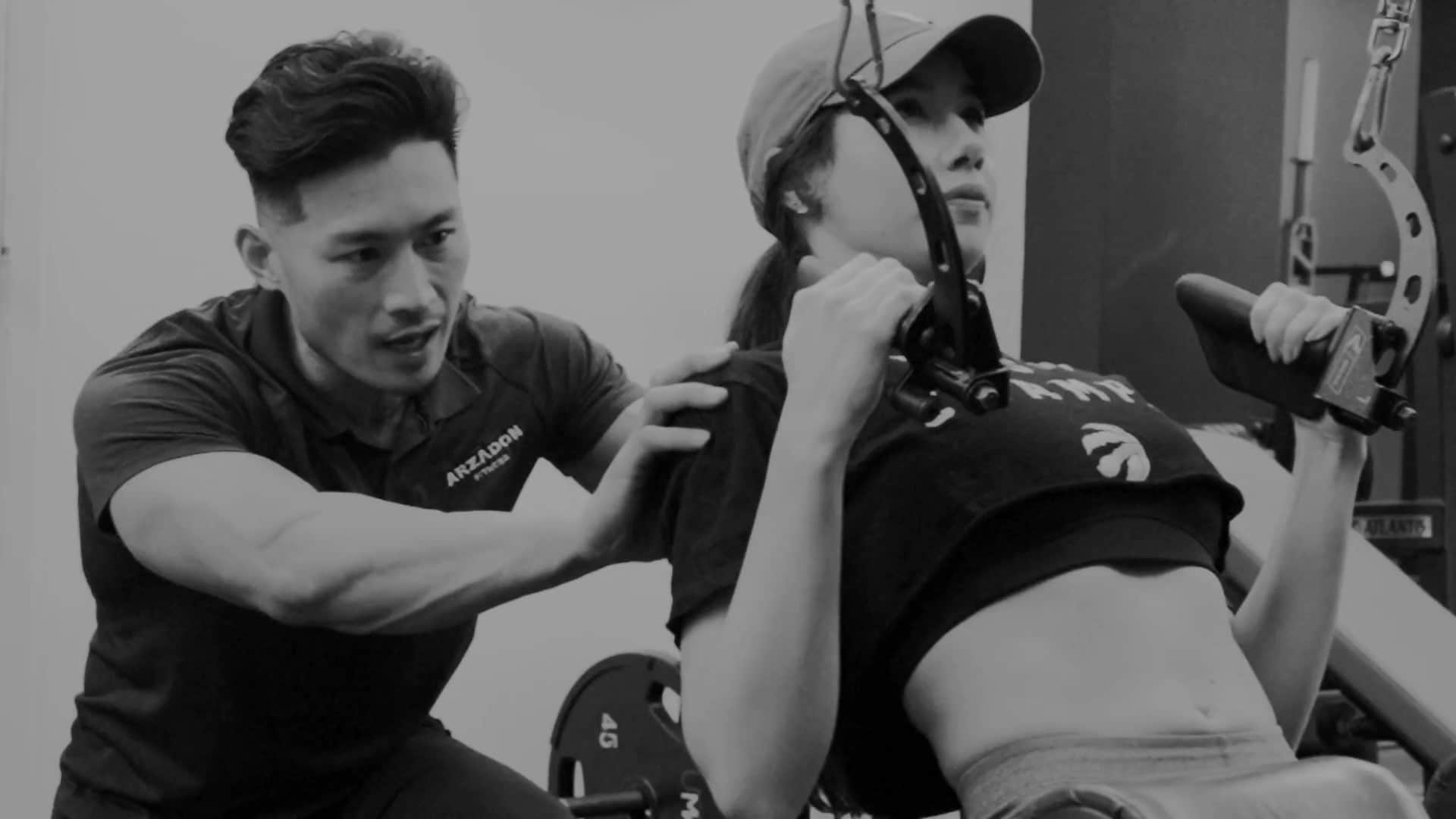 Personal trainer coaching a client at Arzadon Fitness Toronto